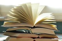 a stack of books on a table