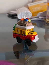 a toy car on top of a table